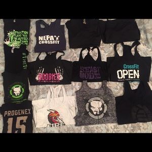 5 Workout tee shirts & 9 workout tank tops. SOLD